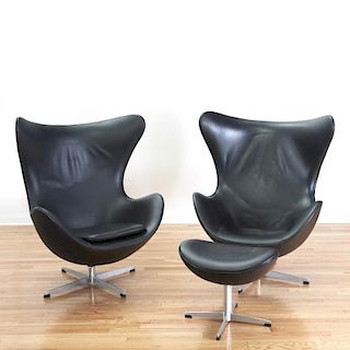 Pair black leather Egg chairs after Arne Jacobsen