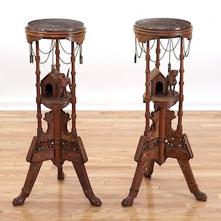 Pair Aesthetic Movement carved walnut fern stands