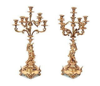 * A Pair of Gilt Bronze Figural Seven-Light Candelabra Height 27 1/2 inches.