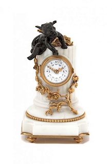 * A French Gilt and Patinated Bronze Mantel Clock Height 8 inches.