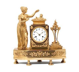 A French Gilt Bronze Figural Mantle Clock Height 15 inches.