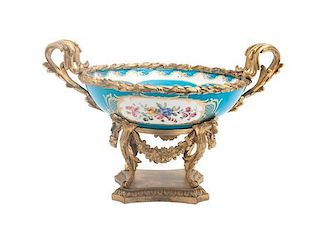 A Sevres Gilt Bronze Mounted Center Bowl Width over handles 14 1/4 inches.