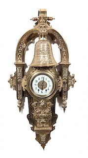 A Victorian Gilt Metal Wall Clock Height 36 inches.