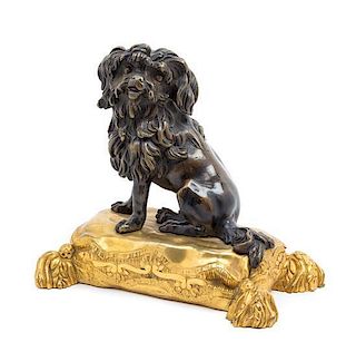 A French Gilt and Patinated Bronze Table Ornament Height 8 inches.