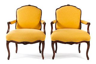 * A Pair of Louis XV Beechwood Fauteuils Height 35 1/2 inches.
