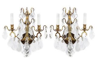 A Pair of French Brass Two-Light Sconces Height 18 3/4 inches.