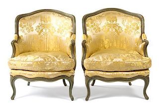 * A Pair of Louis XV Green Painted Bergeres en Gondole Height 34 inches.