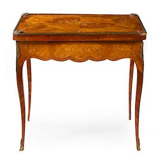 A Louis XV Style Gilt Metal Mounted Marquetry Game Table Height 30 x width 31 3/4 x depth 21 3/4 inches.