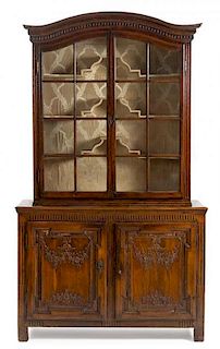A French Provincial Walnut Bibliotheque Height 91 1/4 x width 54 x depth 17 1/4 inches.