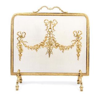 A Louis XVI Style Gilt Bronze Fire Screen Height 28 3/4 x width 28 inches.