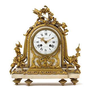 A Louis XVI Gilt Bronze and Marble Mantel Clock Height 13 1/4 inches.