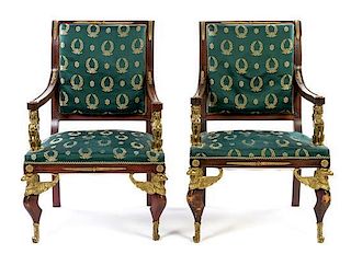 A Pair of Empire Style Gilt Bronze Mounted Mahogany Fauteuils Height 40 1/2 inches.