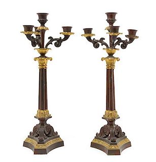 * A Pair of Empire Style Gilt and Patinated Metal Four-Light Candelabra Height 16 5/8 inches.