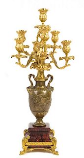 A French Gilt and Patinated Bronze Seven-Light Candelabrum Height 29 3/4 inches.