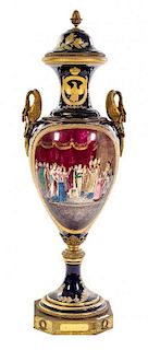 A Large Gilt Bronze Mounted Sevres Porcelain Urn and Cover Height overall 50 inches.