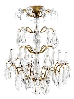 A French Brass and Glass Ten-Light Chandelier Height 33 x diameter 22 1/2 inches.