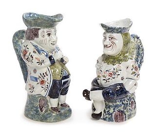 * A Pair of French Pottery Figural Jugs Height of taller 11 1/4 inches.