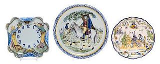 * A Group of Three Quimper Pottery Plates Diameter of largest 12 1/2 inches.