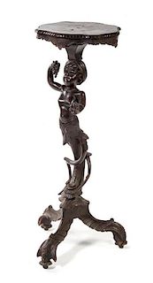 A Venetian Carved Figural Pedestal Height 36 inches.