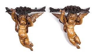 A Pair of Continental Carved Figural Wall Brackets Height 13 1/4 inches.