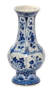 A Delft Pottery Vase Height 9 7/8 inches.
