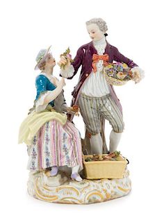 * A Meissen Porcelain Figural Group Height 7 1/4 inches.