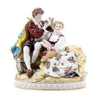 A Continental Porcelain Figural Group Height 8 inches.