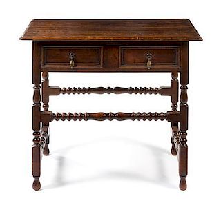 A Charles II Style Oak Side Table Height 28 x width 34 1/2 x depth 23 inches.