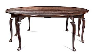 * A Queen Anne Mahogany Drop-Leaf Table Height 28 7/8 x width 78 x depth 20 1/4 inches (closed).