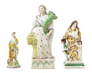 * A Group of Three Staffordshire Figures Height of tallest 12 inches.
