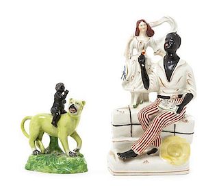 * Two Staffordshire Blackamoor Figural Groups Height of tallest 10 7/8 inches.