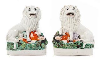 * Two Staffordshire Lion Figures Height 9 1/2 inches.