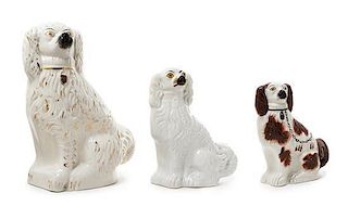* A Group of Three Staffordshire Dogs Height of tallest 15 1/2 inches.