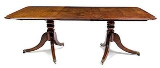 * A George III Mahogany Double Pedestal Dining Table Height 27 1/2 x width 47 1/2 x depth 54 1/2 inches (closed).