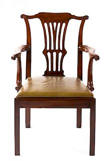 * A George III Walnut Open Armchair Height of first 37 3/4 inches.