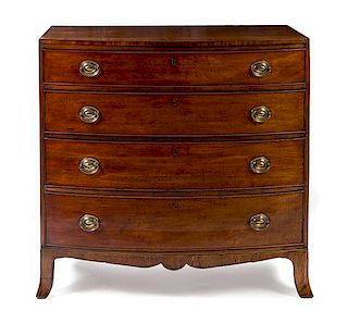 * A George III Mahogany Bowfront Chest of Drawers Height 40 1/2 x width 41 1/2 x depth 21 3/4 inches.