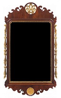* A Chippendale Style Parcel-Gilt Mahogany Mirror Height 47 x width 25 1/2 inches