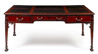 A Chippendale Style Mahogany Partners Desk Height 30 x width 71 1/2 x depth 40 1/4 inches.