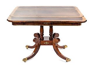 * A Regency Brass Inlaid Rosewood and Satinwood Sofa Table Height 28 1/2 x width 42 x depth 23 1/4 inches.
