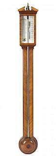 * An English Mahogany Stick Barometer Height 39 inches.
