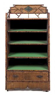 * A Victorian Lacquered Bamboo Bookshelf Height 67 x width 33 1/2 x depth 12 1/2 inches.