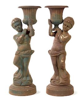 A Pair of Victorian Cast Iron Figural Jardinieres Height 52 inches.