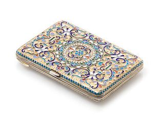 * A Russian Enameled Silver-Gilt Cigarette Case, Mark of Nikolai Pavlov, Moscow, early 20th century, having a matted gilt base d