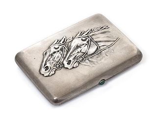 * A Russian Silver Cigarette Case, Mark of Second Artel, Moscow, early 20th century, the lid worked to show two horses racing an