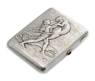 * A Russian Silver Cigarette Case, Mark possibly of Fourth Jewelers Artel, Moscow, the lid worked to show a man in combat with l