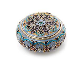 * A Russian Silver and Enamel Snuff Box, Mark of Antip Kuzmichev, Moscow, early 20th century, or circular form, the case having