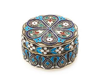 * A Russian Silver and Enamel Pill Box, Maker's mark Cyrillic IS, city mark likely Odessa, of lobed, circular form and decorated
