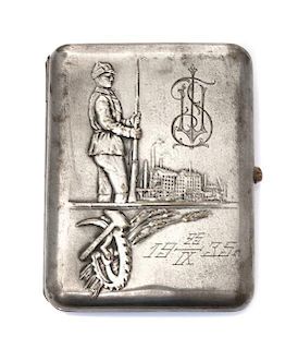 * A Russian Silver-Plate Cigarette Case, Early 20th century, of rectangular form, the lid worked to show a soldier clutching a r
