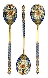 * Three Russian Silver-Gilt and Enamel Teaspoons, Mark of Fedor Ruckert, Moscow, early 20th century, each having a blue enameled
