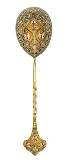 * A Russian Silver-Gilt and Enamel Spoon, Maker's mark obscured, Moscow, late 19th/early 20th century, having a twist handle and